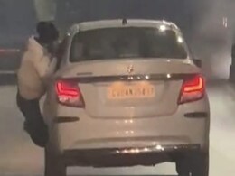 Road Rage: कार ने बाइक में टक्कर मारने के बाद युवक को खिड़की में फंसा कर कई किमी तक घसीटा, देखें Video Road Rage: कार ने बाइक में टक्कर मारने के बाद युवक को खिड़की में फंसा कर कई किमी तक घसीटा, देखें Video