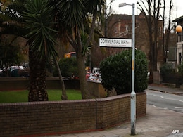 2 Men Run Off With Artist Banksy's Latest Street Artwork In London 2 Men Run Off With Artist Banksy's Latest Street Artwork In London