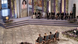 Jailed Iranian Activist's Children Accept Nobel, Chair Kept Empty For Her