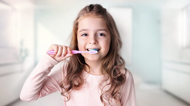 Teach your child to brush their teeth at least twice a day, using a fluoride toothpaste