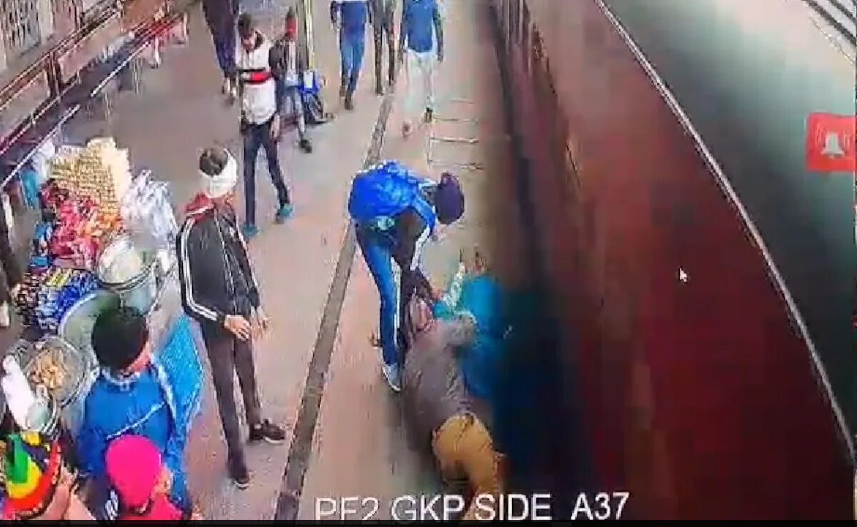 Video: Railway Cop Saves Woman From Falling Under Moving Train In UP