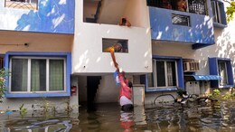Volunteers Wade Through Water To Give Food To People In Rain-Hit Chennai, Plants Still Shut