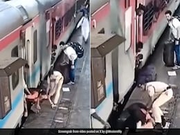 Watch: Railway Cop Saves Woman Who Fell While Trying To Board Moving Train Watch: Railway Cop Saves Woman Who Fell While Trying To Board Moving Train