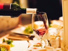 Wine Etiquette 101: 5 Essential Tips For Holding Your Bottle While Pouring Wine