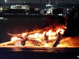 Pics: Plane In Flames At Tokyo Airport After Colliding With Another Aircraft Pics: Plane In Flames At Tokyo Airport After Colliding With Another Aircraft