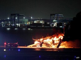 "Miracle" Evacuation From Burning Japan Jet Helped By Fliers Leaving Bags "Miracle" Evacuation From Burning Japan Jet Helped By Fliers Leaving Bags