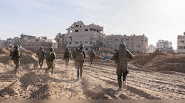 Fighting Across Gaza As Israel Drops Leaflets To Help Locate Its Hostages