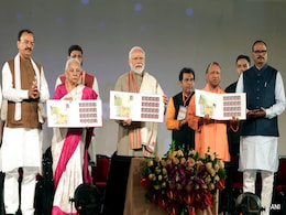 PM Modi Releases Commemorative Postage Stamps On Ram Temple PM Modi Releases Commemorative Postage Stamps On Ram Temple