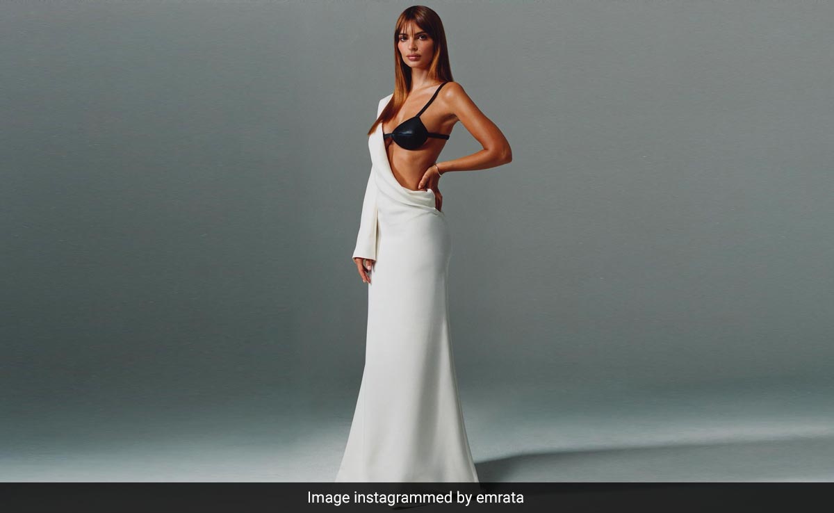 Emily Ratajkowski's White Gown Is Elegance On One Hand And Edgy On The Other