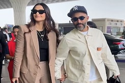 Sonam Kapoor And Anand Ahuja Pose At Airport Sonam Kapoor And Anand Ahuja Pose At Airport