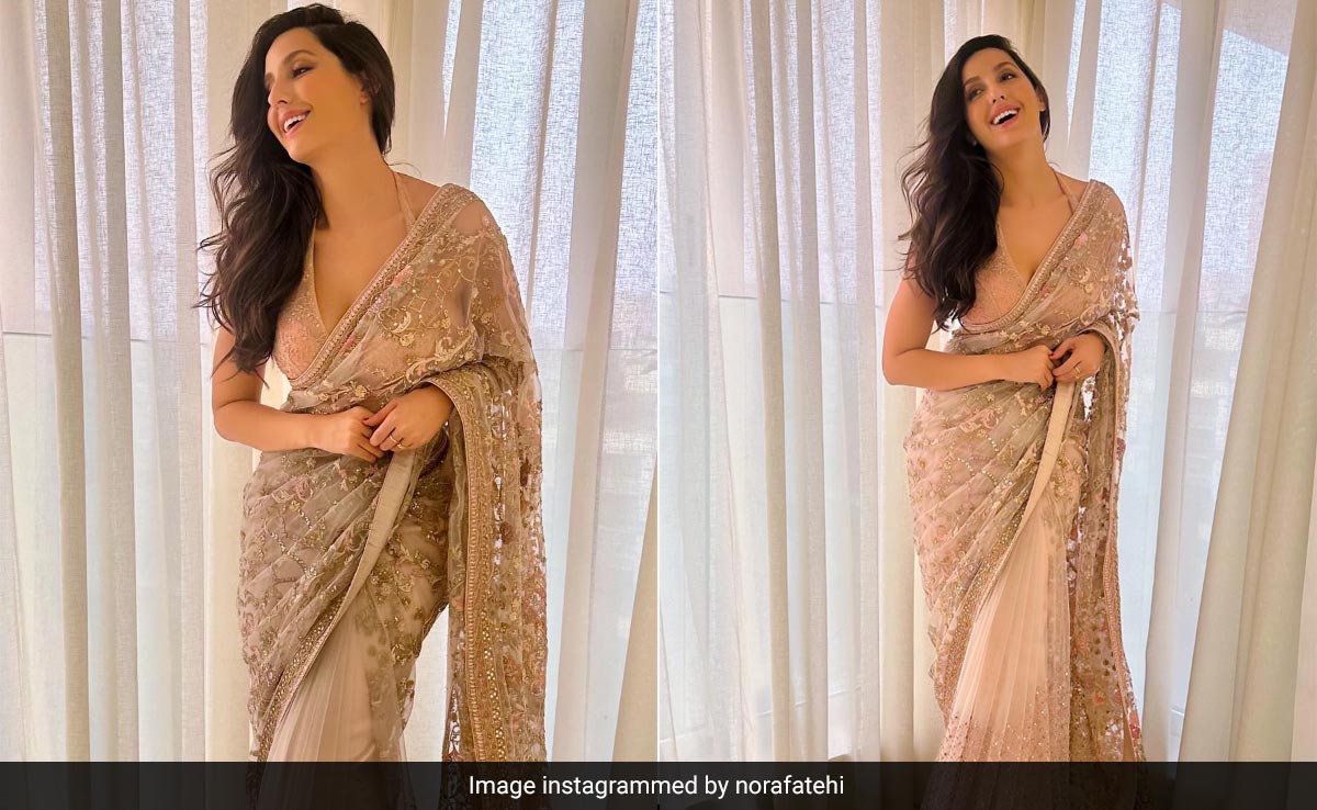 Nora Fatehi Ditches The Big, Bold, "Bossy" Vibe For This Soft Sheer <i>Saree</i>