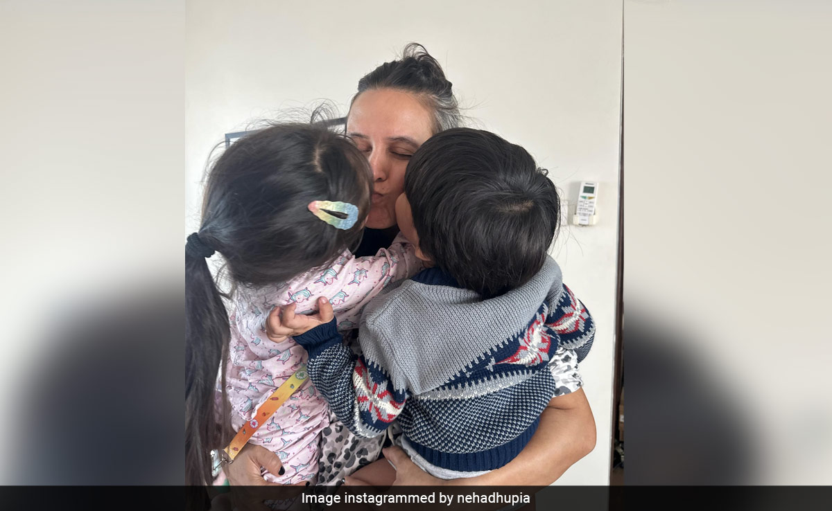 Neha Dhupia And Angad Bedi's Son Is Already A Sustainable Fashionista In His Dad's Childhood Sweater