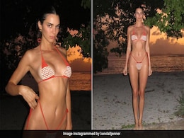Kendall Jenner Matches Her Beach Time Swim Set To The Orange Sunset Kendall Jenner Matches Her Beach Time Swim Set To The Orange Sunset