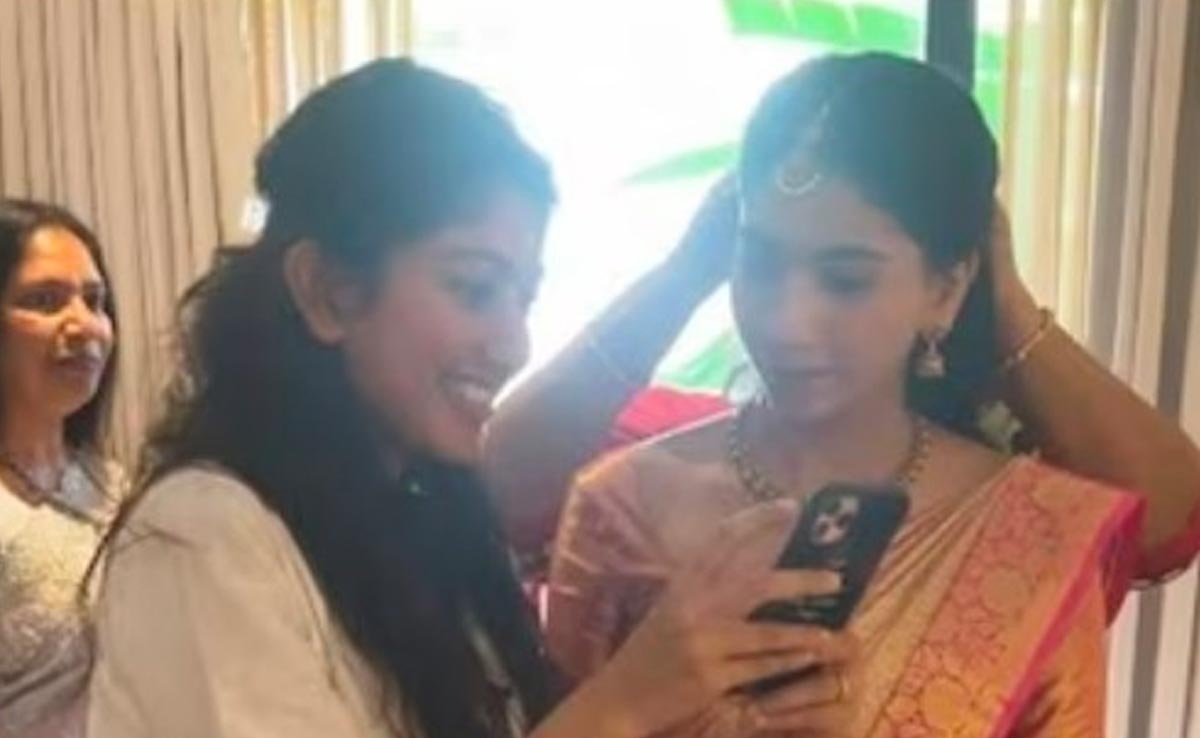 बहन को साड़ी पहनाने में मदद करती दिखीं साई पल्लवी, फैन्स बोले - एक ही दिल है कितनी बार जीतोगी