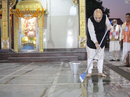 Amit Shah Visits Assam Temple, Participates In Cleanliness Drive Amit Shah Visits Assam Temple, Participates In Cleanliness Drive