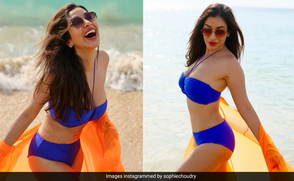 "Happiness Comes In Waves" Like Sophie Choudry In A Bright Blue Swim Set