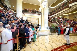 PM Modi Receives Grand Welcome By Indian Community In Abu Dhabi PM Modi Receives Grand Welcome By Indian Community In Abu Dhabi