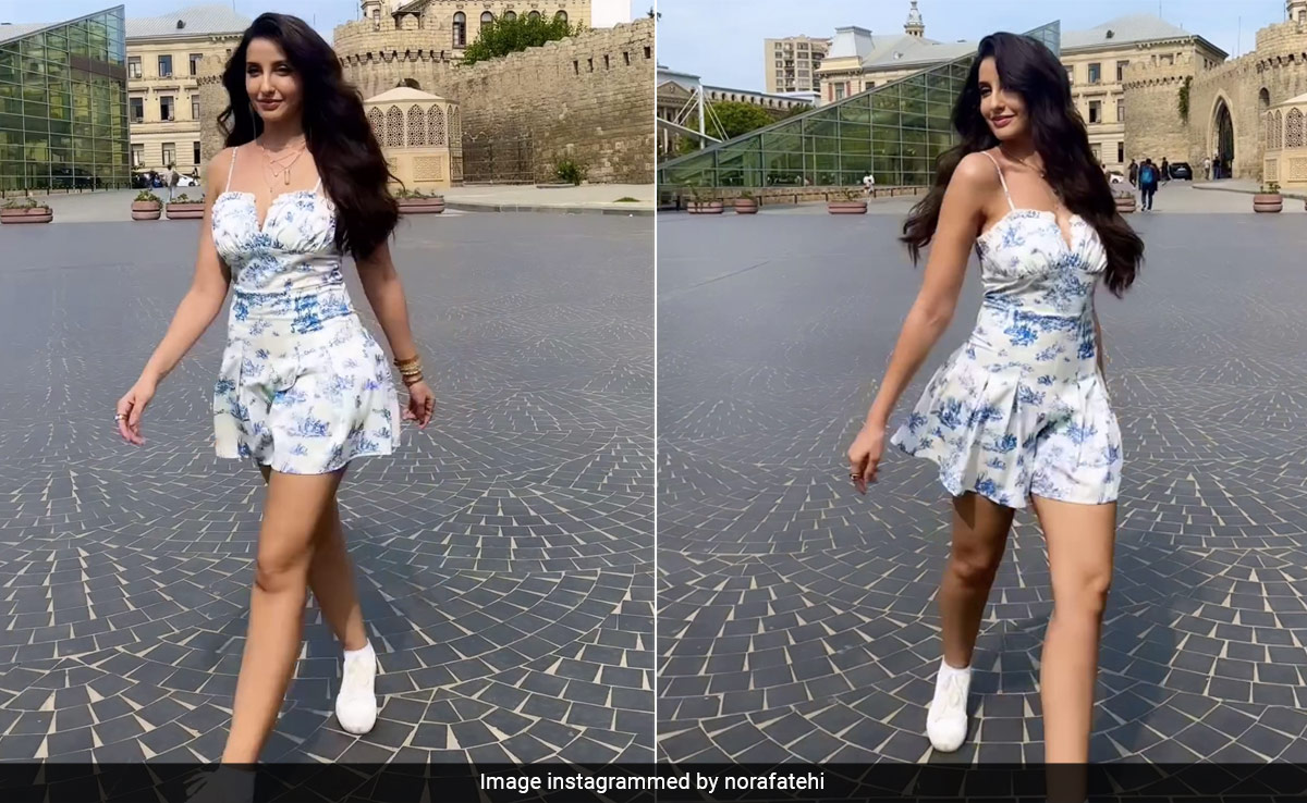 Nora Fatehi Dances Through An Early Summer In A Blue And White Printed Playsuit
