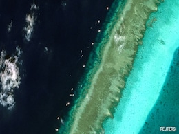 Satellite Images Show Floating Barrier At Disputed South China Sea Reef Satellite Images Show Floating Barrier At Disputed South China Sea Reef