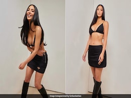 Kim Kardashian's Prada Bralette And Skirt Combo With Black Boots Is The Perfect Fashion Transition To Spring Kim Kardashian's Prada Bralette And Skirt Combo With Black Boots Is The Perfect Fashion Transition To Spring