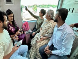 Pics: Nirmala Sitharaman's Mumbai Local Train Ride, Selfies With Commuters Pics: Nirmala Sitharaman's Mumbai Local Train Ride, Selfies With Commuters
