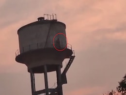 Rajasthan Dalit Woman Climbs Water Tank, Demands Arrest Of Her Rapist Rajasthan Dalit Woman Climbs Water Tank, Demands Arrest Of Her Rapist