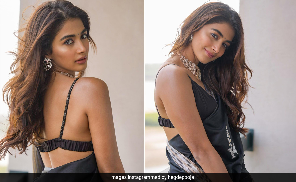 Pooja Hegde Is An Ethnic Vision Come To Life In A Black And Silver Shanti Banaras <i>Saree</i>