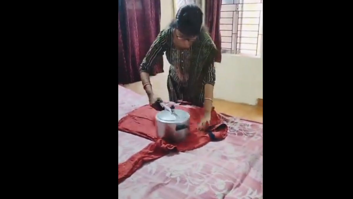 Ironing Innovation Goes Viral: Woman Uses Pressure Cooker To Get Crisp Clothes