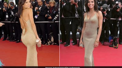 eva longoria gold dress In 2005, Made Her Cannes Film Festival Red Carpet Debut Wearing A $40 Knit Gown Model: IMAGE NOT UPLOADED