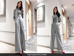 Nora Fatehi's Grey Pantsuit Wins The Power-Dressing Game Like Never Before Nora Fatehi's Grey Pantsuit Wins The Power-Dressing Game Like Never Before