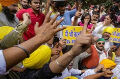AAP vs BJP Protests In Delhi Over Arvind Kejriwal's Arrest AAP vs BJP Protests In Delhi Over Arvind Kejriwal's Arrest