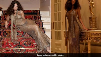 Emily Ratajkowski's Gold Chainmail Dress Takes Her Love For Sheer To A Whole New Level Emily Ratajkowski's Gold Chainmail Dress Takes Her Love For Sheer To A Whole New Level
