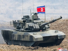 Kim Jong Un In Leather Jacket "Drives" North Korea's New Tank In Mock Battle Kim Jong Un In Leather Jacket "Drives" North Korea's New Tank In Mock Battle