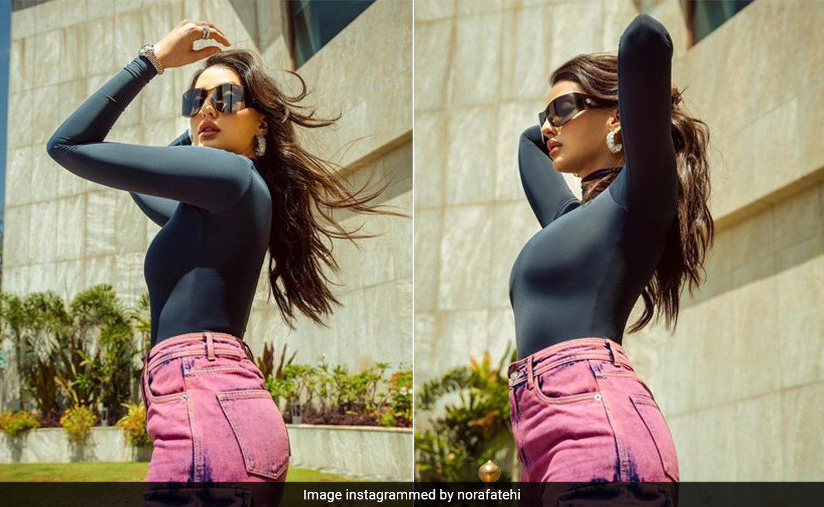 Nora Fatehi's Distressed Pink Jeans With A Black Turtleneck Is Casual Chic Style Like Never Before