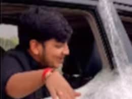 प्लास्टिक में लपेटकर चलती गाड़ी के दरवाजे से लटकाया, जानलेवा स्टंट देख पब्लिक का फूटा गुस्सा, इन्फ्लुएंसर को लताड़ा