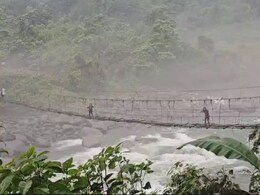 Watch: Arunachal Officials Cross Mountains, Rivers For Repolling In 8 Booths Watch: Arunachal Officials Cross Mountains, Rivers For Repolling In 8 Booths