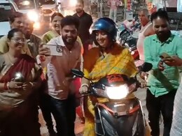 Watch: Minister Smriti Irani's Scooter Ride In Amethi Watch: Minister Smriti Irani's Scooter Ride In Amethi