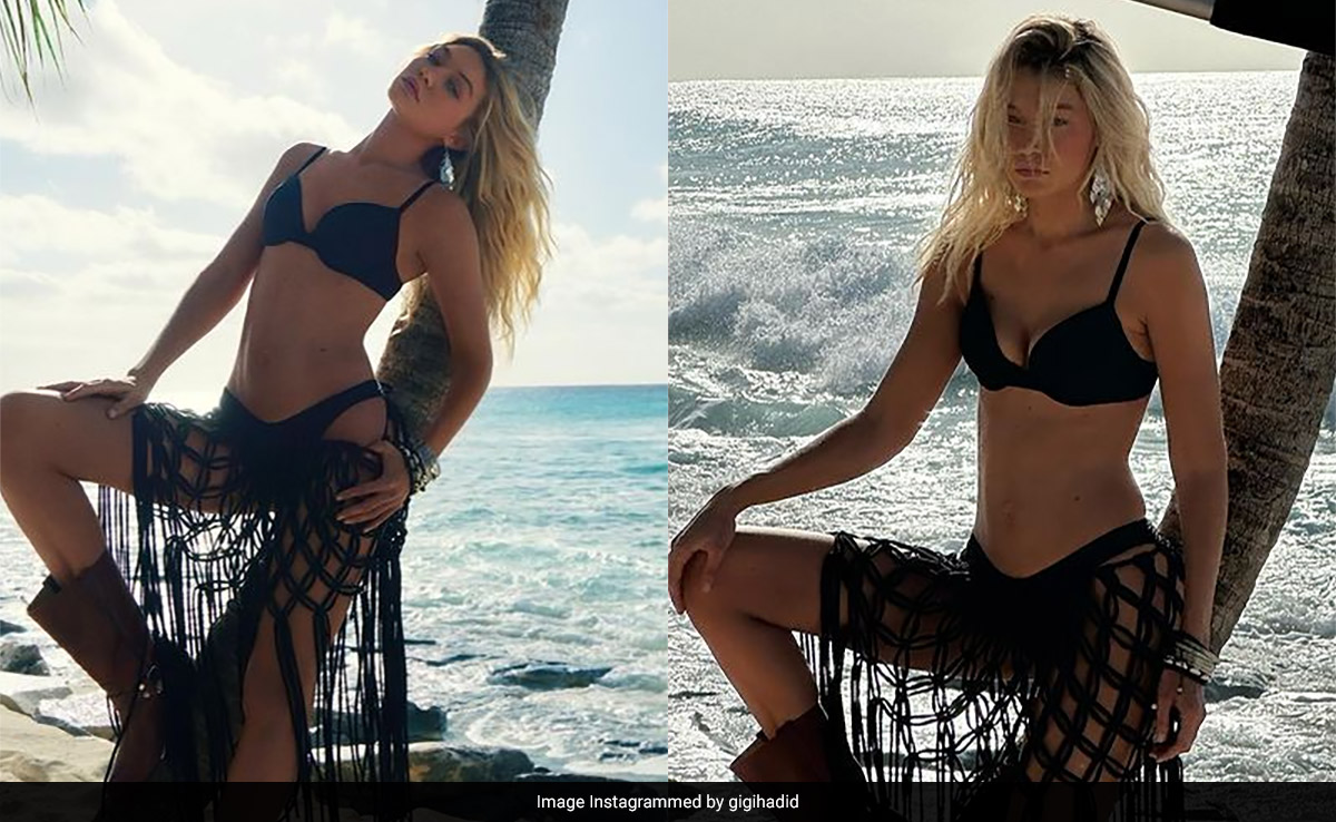 No One Serves Summer Vibes Hotter Than Gigi Hadid In A Black Swim Set On A Sandy Beach