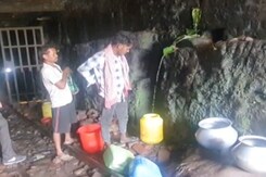 Dhanbad Residents Collect Water From An Abandoned Coal Mine For Their Daily Needs Dhanbad Residents Collect Water From An Abandoned Coal Mine For Their Daily Needs