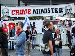 Relatives Of Israeli Hostages Burn Symbolic Table Outside Netanyahu's House Relatives Of Israeli Hostages Burn Symbolic Table Outside Netanyahu's House