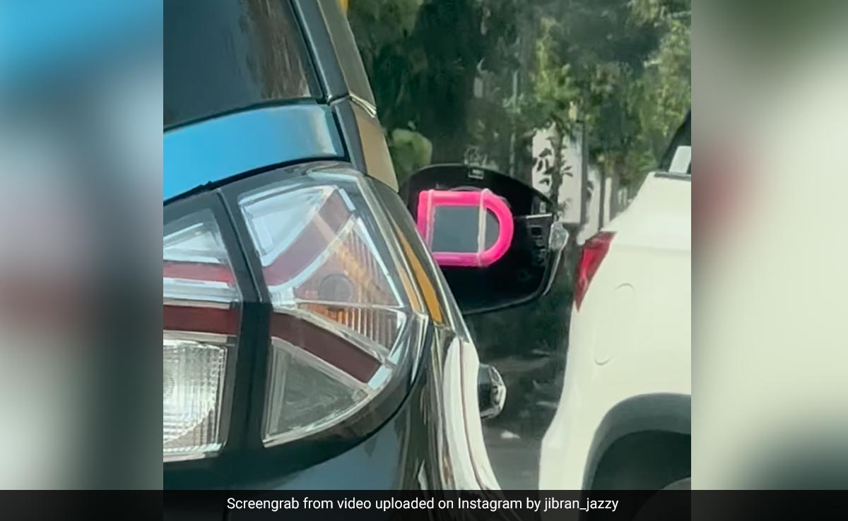 Man Replaces Broken Nexon Mirror With A Pink Plastic One In Peak "<i>Jugaad</i>"