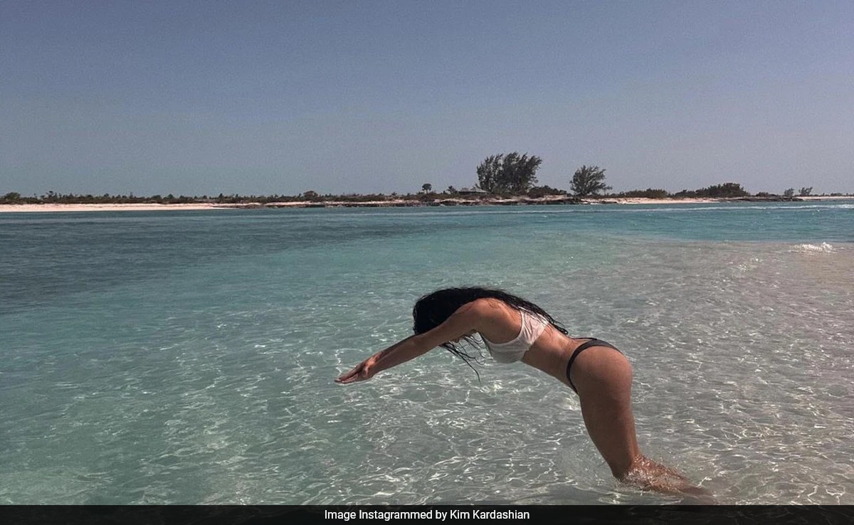 kim kardashian wore a 22-year-old dress in the ocean fans are alarmed by 'dangerous' detail new glam photos... hours before bar results Kim Kardashian Shares 'Just a