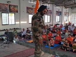 Retired Soldier Suffers Heart Attack, Collapses On Stage Clutching Flag