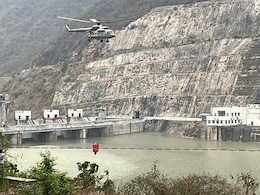 Air Force Chopper Joins Effort To Douse Forest Fires In Uttarakhand Air Force Chopper Joins Effort To Douse Forest Fires In Uttarakhand