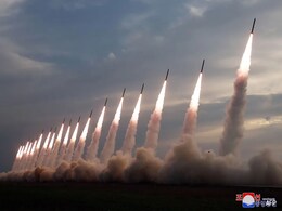North Korea's Kim Jong Un Oversees Rocket Launcher Test North Korea's Kim Jong Un Oversees Rocket Launcher Test