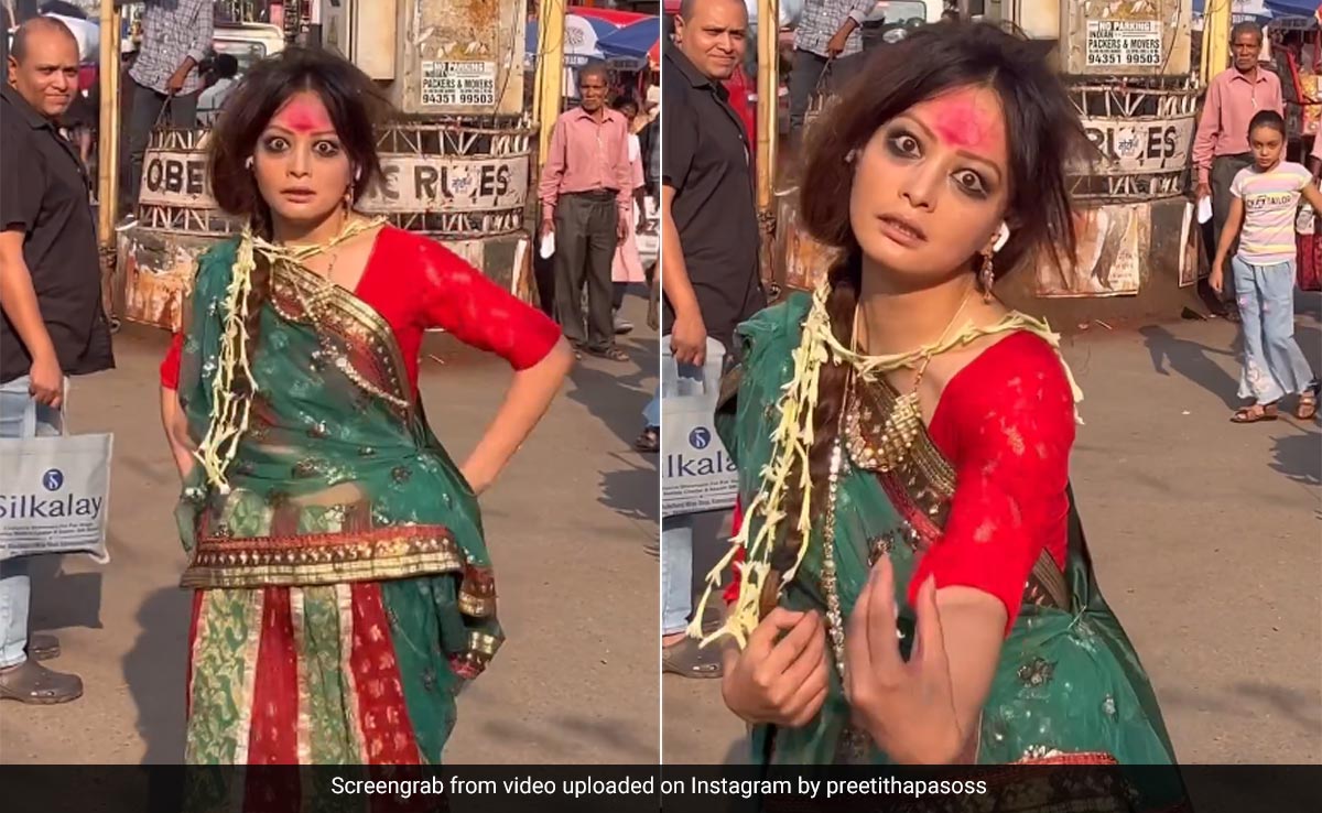 Watch: Influencer Dressed As <i>'Manjulika'</i> Dances To <i>'Ami Je Tomar'</i> On Guwahati Street, Internet Reacts