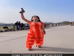 UP Police to Probe Woman Waving Pistol On Highway After Video Goes Viral UP Police to Probe Woman Waving Pistol On Highway After Video Goes Viral