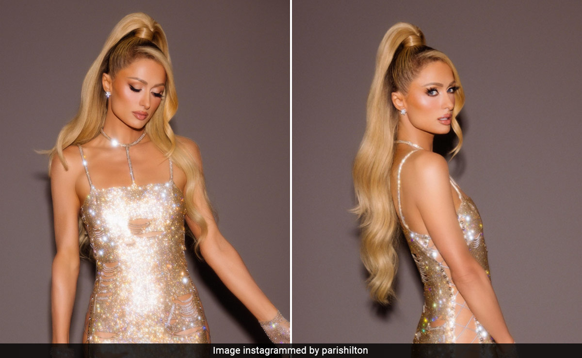 Paris Hilton Is Looking Every Bit Like Her "It Girl" Self In A Sparkling Mini Dress With Cutout Lace-Up Sides