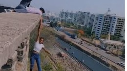 Video: Pune Woman Dangles From Tall Building Holding Man's Hand For Reel