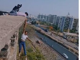 Video: Pune Woman Dangles From Tall Building Holding Man's Hand For Reel